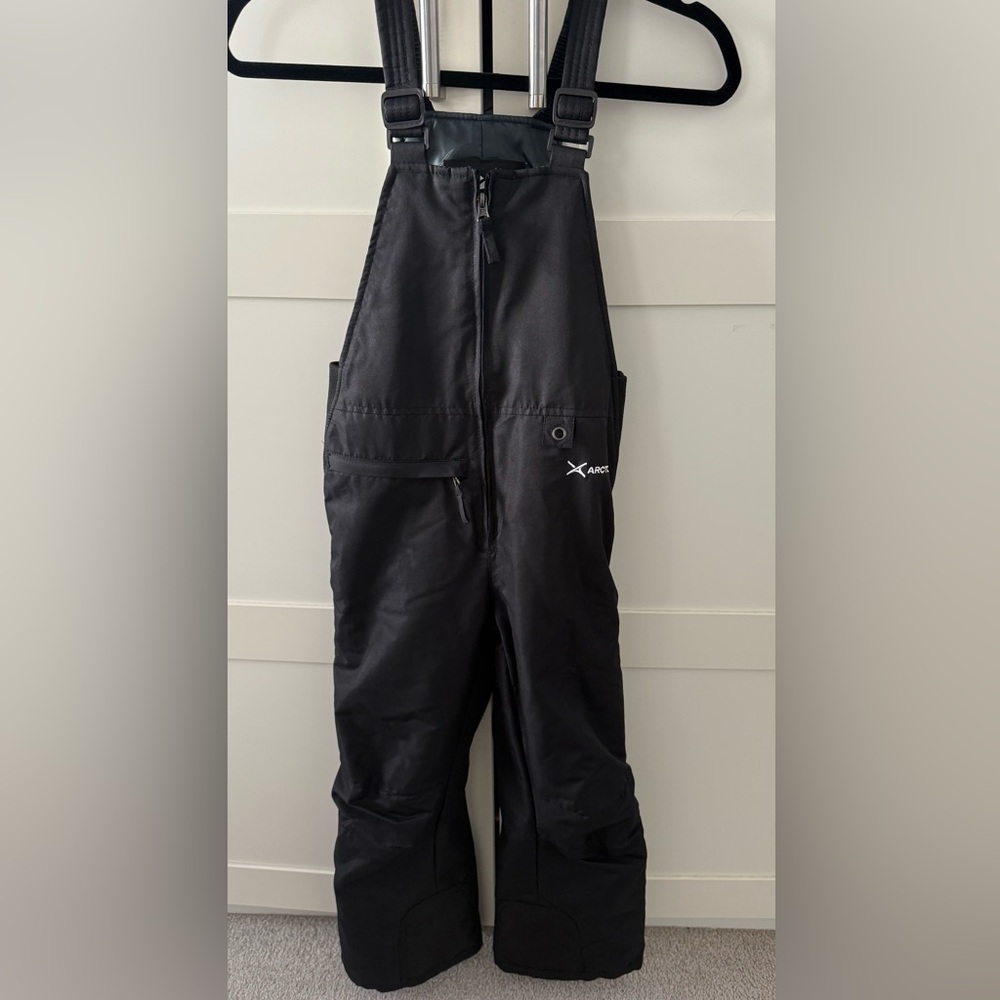 Arctix insulated youth snow bib size small.